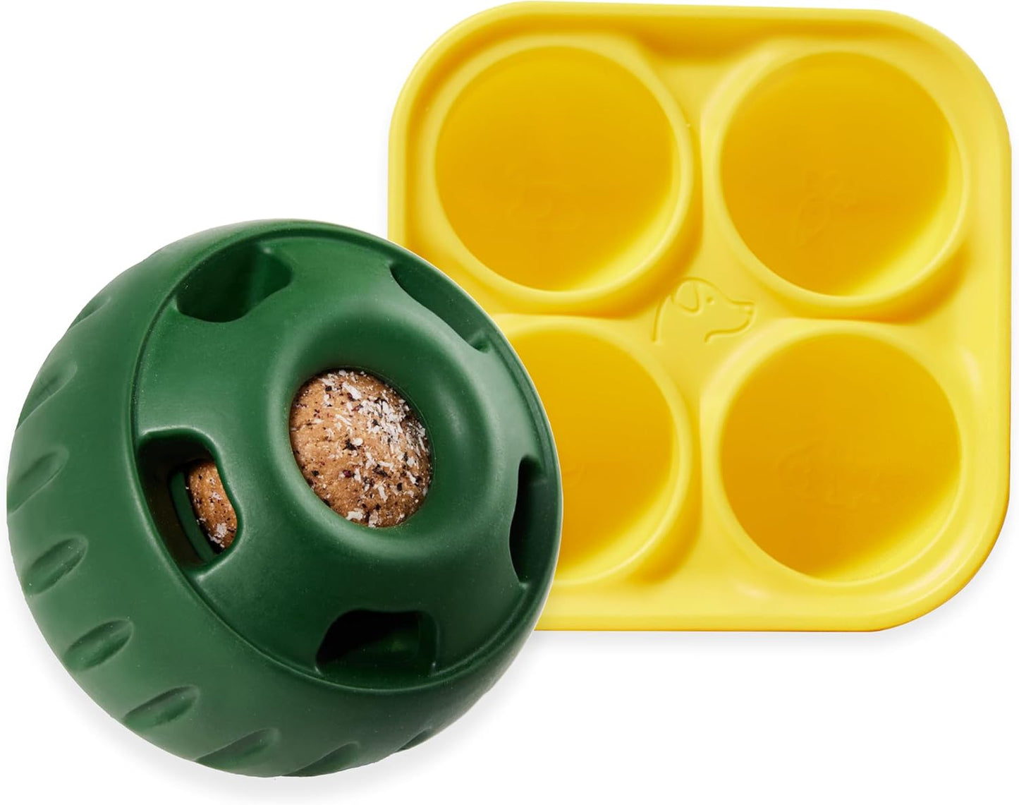 Green dog toy ball with a treat inside next to a yellow silicone mold on a white background
